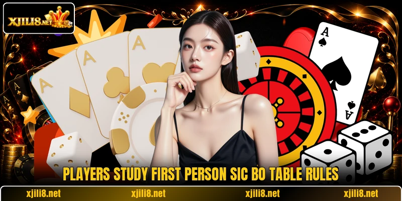 Players study First Person Sic Bo table rules Players study First Person Sic Bo table rules